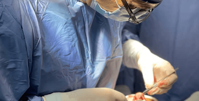 Dr. Renato Zaccheddu, cosmetic and plastic surgeon, during a surgical procedure.