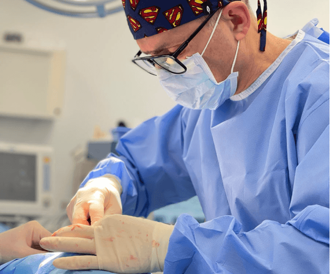 Dr. Renato Zaccheddu, cosmetic and plastic surgeon, during a surgical procedure.