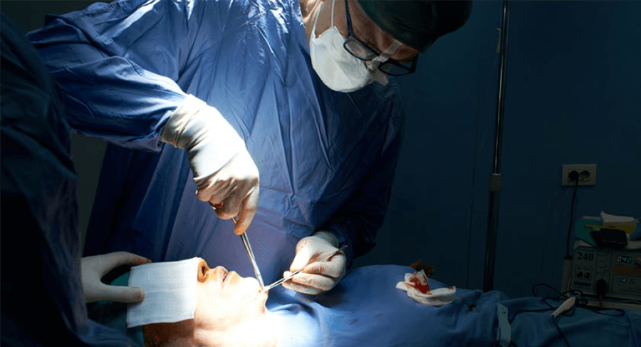 Dr. Renato Zaccheddu, cosmetic and plastic surgeon, during a surgical procedure.